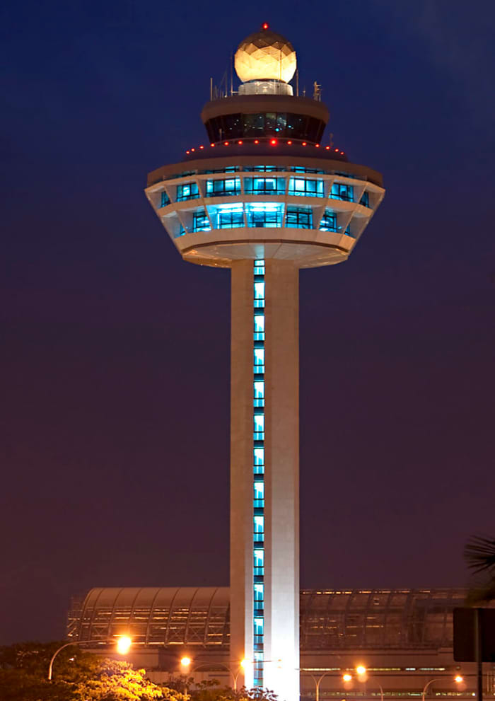 The iconic control tower of Changi Airport is a beacon that welcomes international visitors to Singapore.