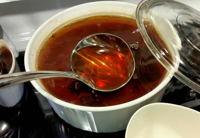 Spicy tea ready to ladle into your cup.