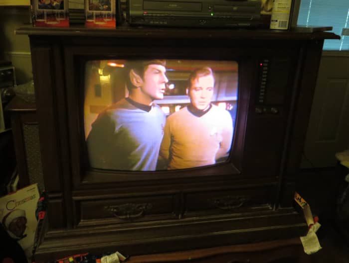 Leonard Nimoy as Mr. Spock, and William Shatner as Captain Kirk on the 1980 Curtis Mathes Model G550, Star Trek, Amok Time. Color Television Console, Early American Design, Chassis C81-7 Medium Pecan.