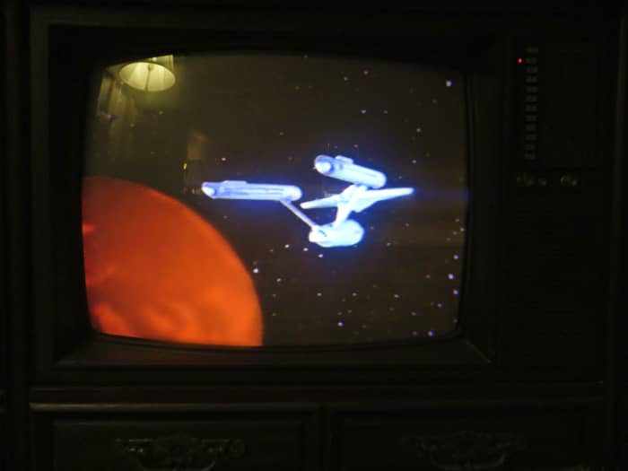The Star Ship Enterprise, Star Trek VHS Tape on the 1980 Curtis Mathes TV Model G550. Color Television Console, Early American Design, Chassis C81-7 Medium Pecan. Both the tape and the television had been in a storage shed for countless years.