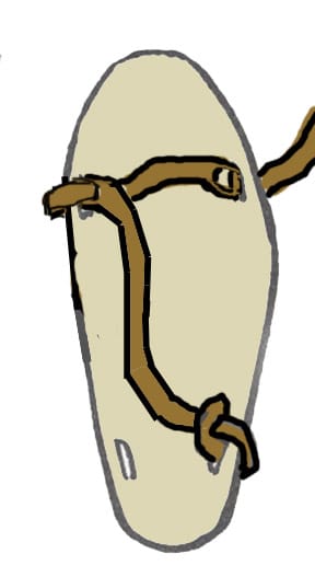 Cross the foot to the opposite side front hole. Go over the outside of the sole and come up through the bottom of the lace hole.
