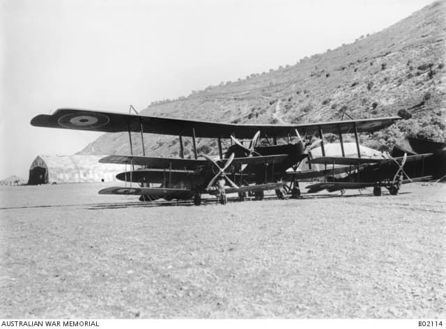 A Handley-Page and two Bristol Fighters show the state of aircraft by September 1918 - looking much more like a modern airplane than a pile of junk a crazy neighbor hammered together.