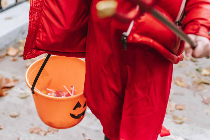 Give out Halloween candy, and watch the younger children's excitement. Photo by Charles Parker from Pexels