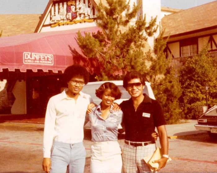 Classmates posing for photos in front of the Royal Dunfey Hotel where we were housed during training.