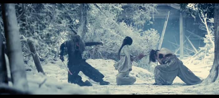 From Warner Bros. Pictures (Japan). The slaying of Tomoe that occurred years before the events that the franchise takes place in. She dies saving Kenshin from a killing blow while also in the path of Kenshin's blow.