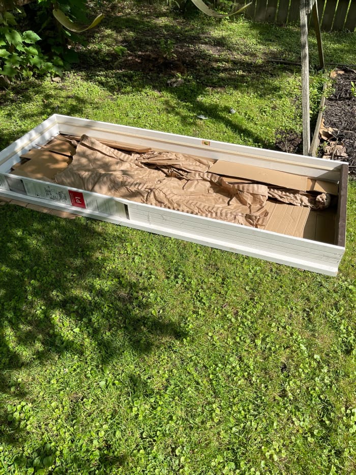 I'm planning on burying my next batch of bokashi pre-compost under this raised bed I have planed for next spring. Yes, this is a raised garden bed frame and not just an old door frame I found in my garage...