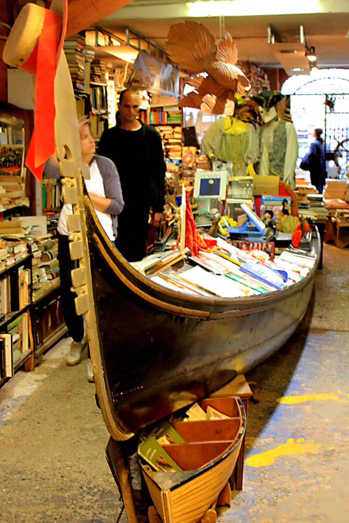 Libreria Acqua Alta - A gondola stuffed with books in the famous Venetian book store