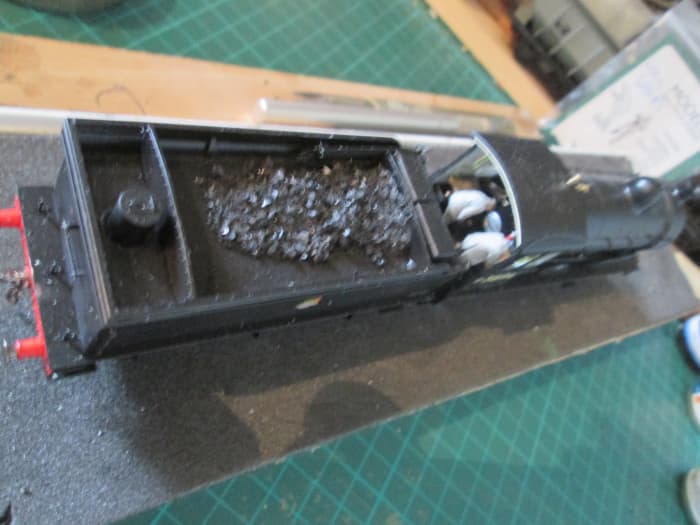 Rear view into the cab over the tender. Fire irons are included in the package, as well as 'cradle' to put them in.