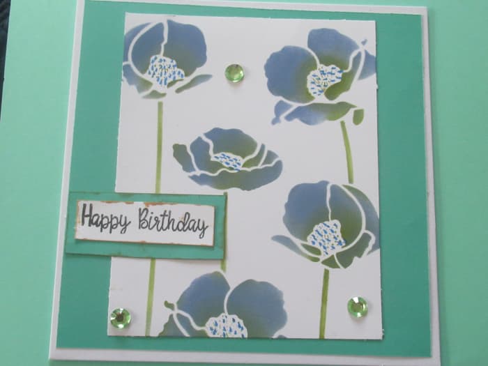 You can use layered stencils as single units to create simple cards that are beautiful on it's own.