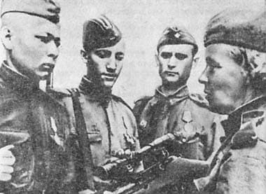At the 1943 army shooting competitions. From left to right: N.A. Larukov, I.N. Bankov, V.F. Khakhaev and N.P. Petrova.