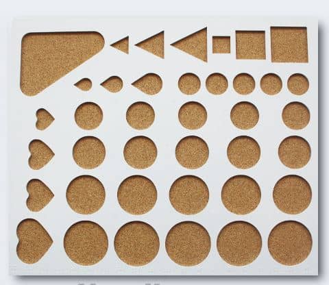 A quilling board helps you the size and shape different rolls so that your quilling shapes are all the same size. This is a perfect tool for beginning quillers.