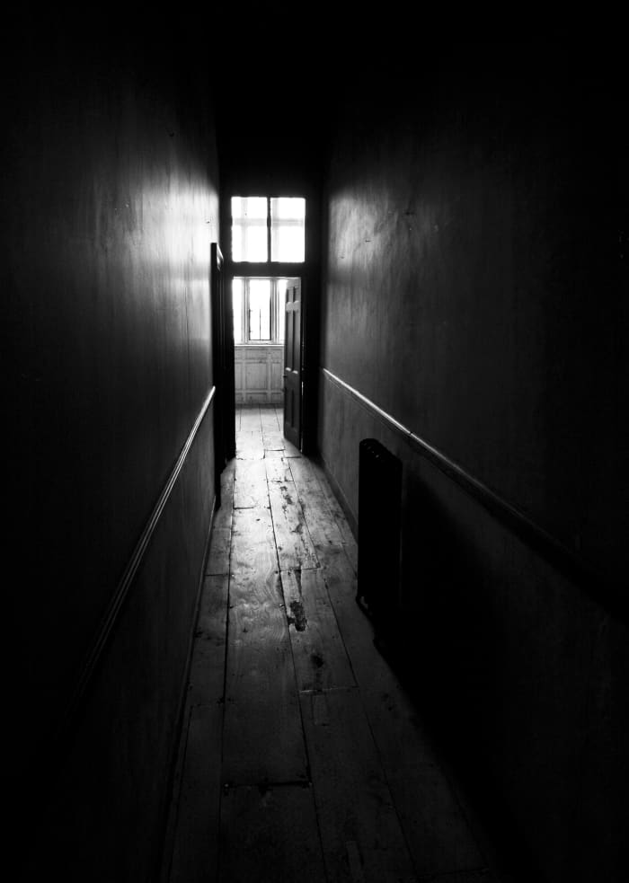 Ophelia is not a stranger to gloomy corridors. This enforces a narrative continuity and hints at the intricacy of the human mind.