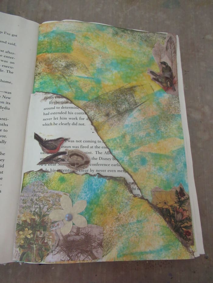 You can create layered pockets on your junk journal pages by ripping papers and gluing them onto the page.