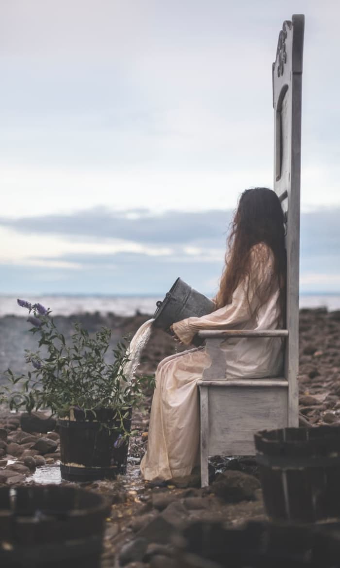 The Queen of Cups is a positive card, especially in the upright position. The Queen is someone who has great creative potential and a compassionate heart. This is sometimes referred to as a female soul mate.