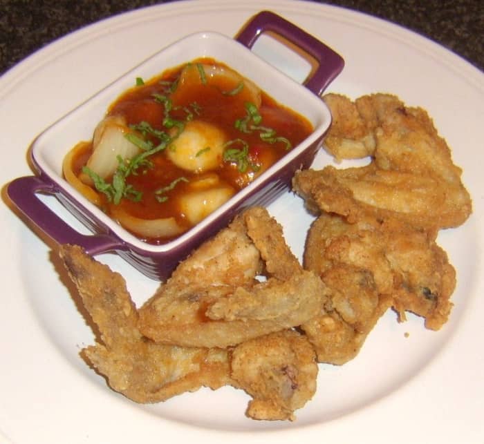 Crisp and crunchy deep fried wings with sweet and sour vegetables is one of the chicken wings recipes featured below