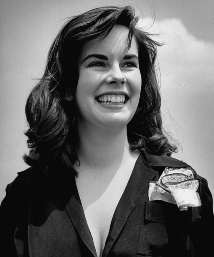 Socialite Oona O'Neil, daughter of playwright Eugene O'Neill, Salinger's former love interest who he used to create the character Rebel in his novel Catcher in the Rye. She sends Salinger a Dear John letter while he was in training.