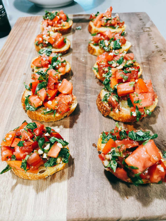 Homemade bruschetta with fresh ingredients from my father-in-law's garden. This bruschetta is perfect for an appetizer or snack. Oh, they are delicious!