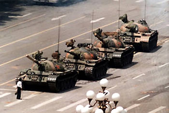 1989. A lone civilian defies the tanks during the Chinese repression of Tiananmen Square freedom of speech protests. It is still not known whether this peaceful demonstrator was executed by the authorities