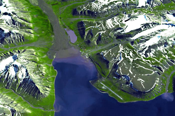 Norway - the blue of liquid water, the white of snow on mountains, and the green of life make Earth the most interesting of all planets