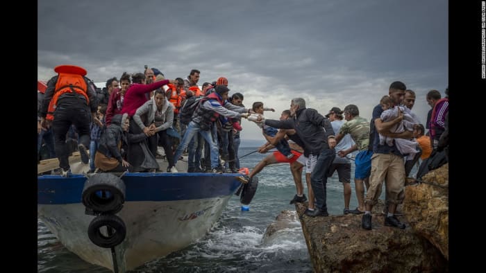 Refugees use all sorts of opportunities to go where they think is safe fore them. this group of refugees have embarked on a boat and reached what seems an island in the Mediterranean Sea
