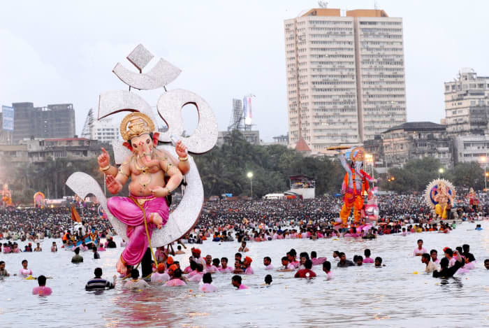 Huge idols of Ganesha being immersed in the sea at Mumbai during Visarjan .... There are environmental concerns connected to this. Now, eco-friendly small idols are gaining popularity ....