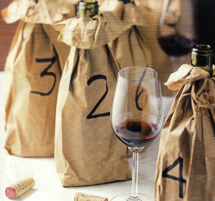 Disguising your wine bottles need not be fancy. If your opting for a blind tasting, this is a simple and creative wine to mask the vessels.