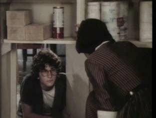 Ronald Wilby (Scott Jacoby) avoids jail by living in the walls of his house with the help of his mother (Kim Hunter)