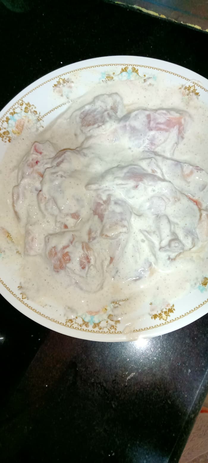 Marinate chicken with ginger-garlic paste, salt, white pepper powder, black pepper powder, curd, and cream for minimum 1 hour or max overnight.