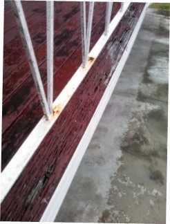 This landing needs fixing, this is a section of landing seen from the side, note the bear patch of timber where the paint is fallen off, because the timber is rotten.