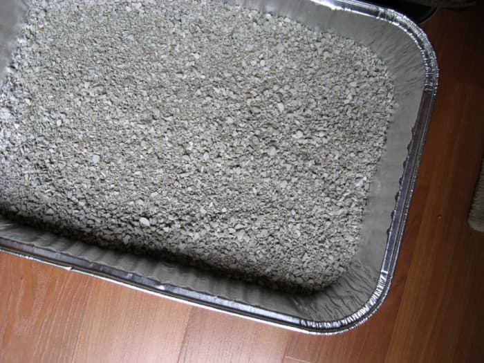 I use the same (clean) kitty litter each winter. Just store it in a tub with a stack of the cheap roasting pans when you aren't using it.