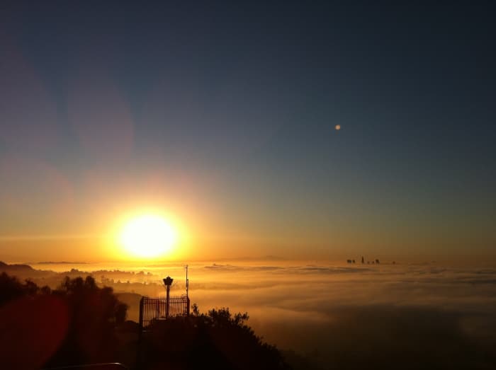 Sunrise from the Mulholland Drive lookout point in Hollywood / Los Angeles, California