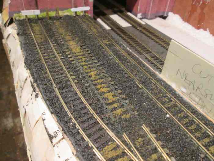 Some minor 're-modelling', one of the old tracks in the coal depot has been lifted, the point set to take wagons into the nearside siding for storage and/or scrappage