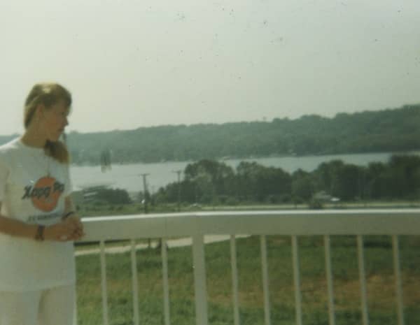 My daughter is looking out at the "Old Man River" from the balcony of the Welcome Center at Le Claire, Iowa, in 1989.