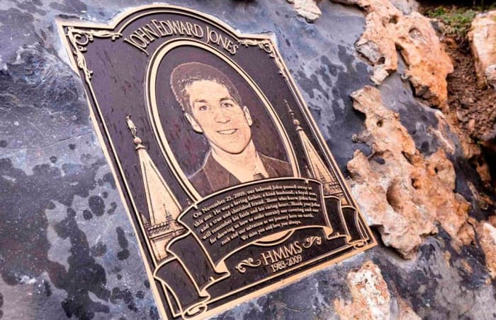The plaque dedicated to John Edward Jones after the cave was closed for good, with his body sealed inside.