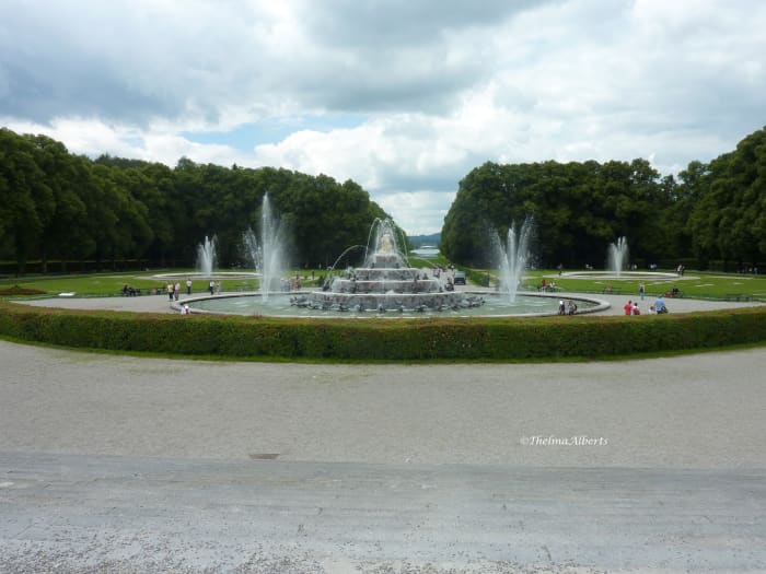Herrenchiemsee Palace view of the garden fountain in front of Chiemsee, a lake in Bavaria, Germany.