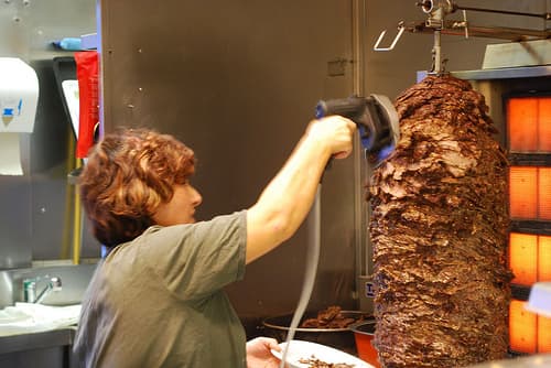 Many people save gyros for eating out because the big slabs of meat look intimidating to cook home. You can make a smaller version, though, or better-- a gyroburger!