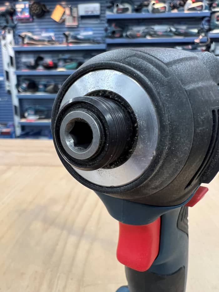 Detail of the hexagonal bit holder on an impact driver.