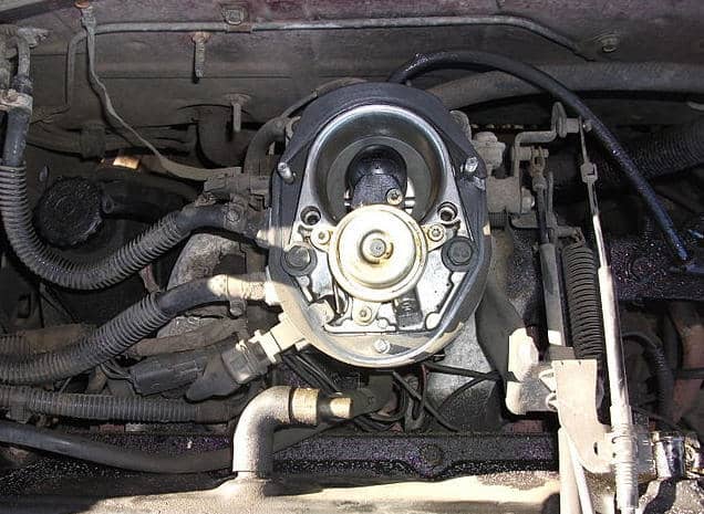 On throttle body injection (TBI) systems, the fuel injector is located above the throttle plates when assembled.