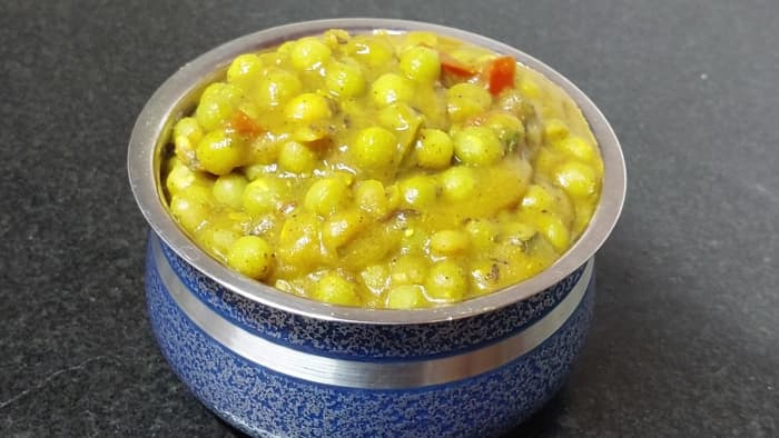 Tasty dry green peas masala is ready to serve. Serve hot with chapati, roti, paratha, naan, phulka or dosa and enjoy.