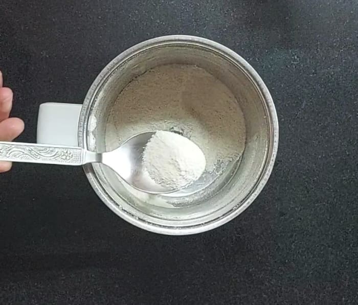 In a dry mixer jar, take roasted poha, close the lid and grind to a fine powder. Transfer to a vessel.