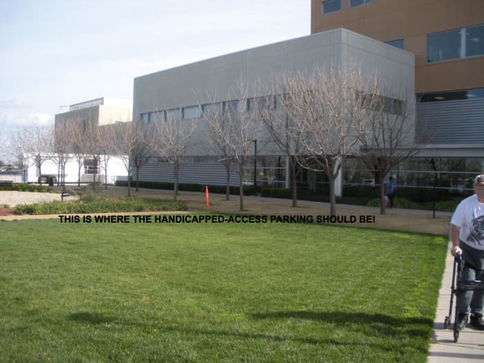 There is approximately 75 yards between the building entry and the first parking spaces designated for handicapped persons. That is too far away!
