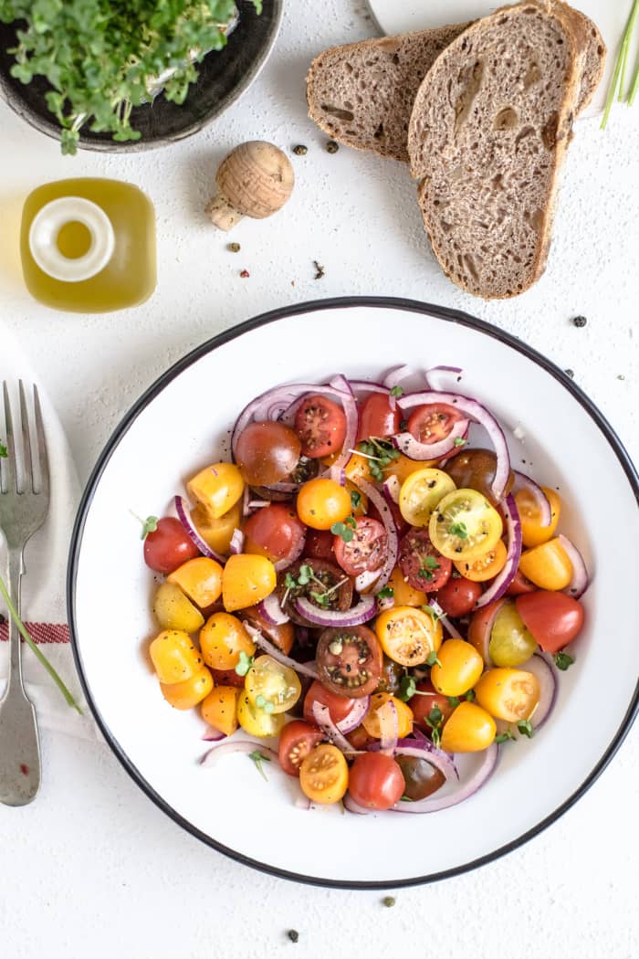 This salad looks great: but the number of tomatoes and the presence of onions may be 2 triggers for IBS sufferers