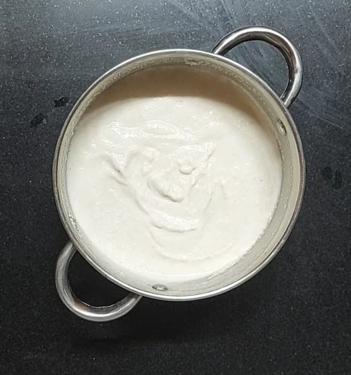 Add water in between if the batter is too thick. Close the lid and let it ferment for 7-8 hours or overnight.