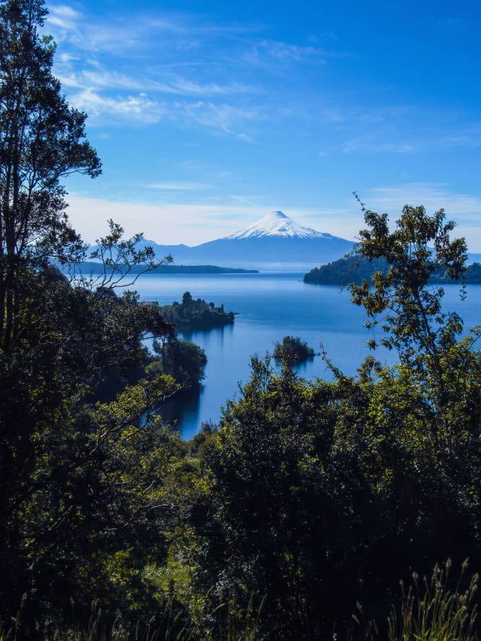 A picture of Llanquihue Lake and the Osorno Volcano in Chile. Location: Frutillar, Los Lagos, Chile.