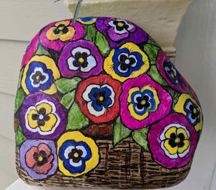 In this tutorial, I will lay out for you step by step through outlines, video demonstrations and links to informative articles that will show how I took an image of a beautiful basket of pansies and transferred it onto a rock.