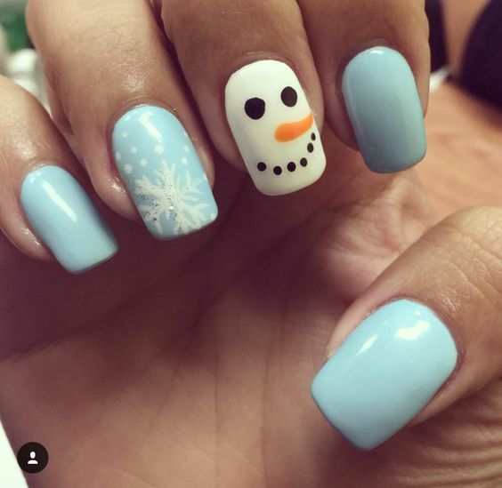 Paint a simple snowman face using a dotting tool