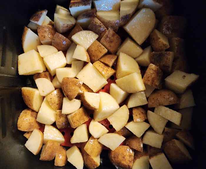 Place the potatoes in a single layer in air fryer basket. Air fry at 400 degrees for 35 minutes.