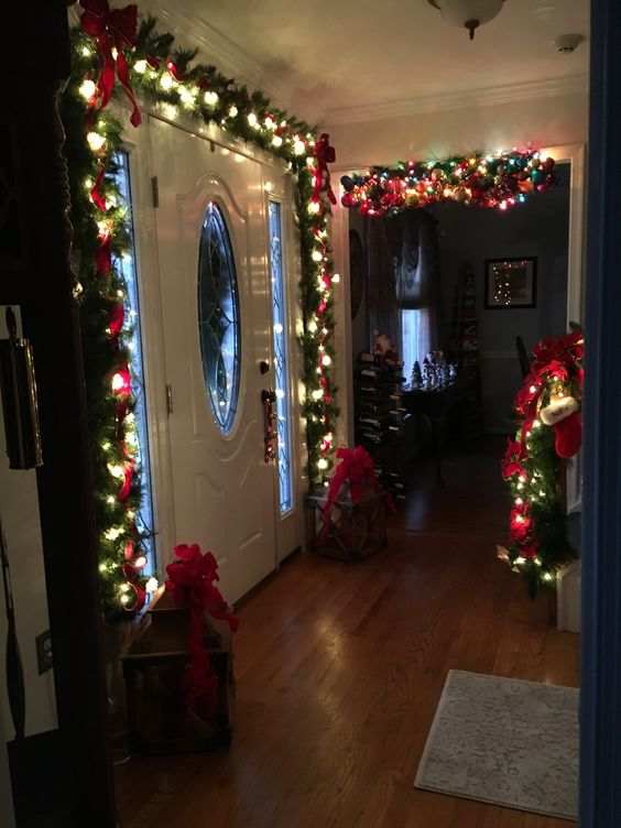 Garland over the door in an entryway makes a huge impact