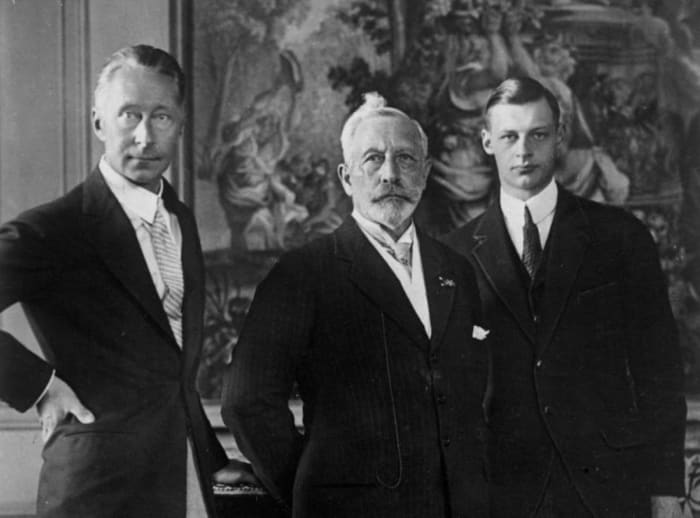 Kaiser Wilhelm II stands between Crown Prince Wilhelm "Little Willie" to his left and Prince Wilhelm (grandson) to his right.