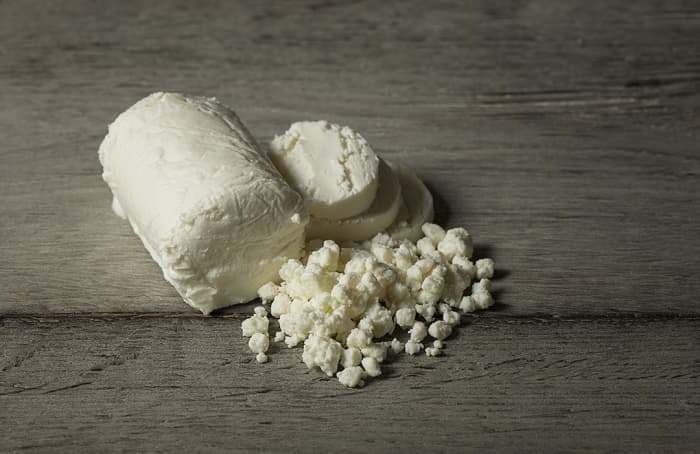 Fresh goat cheese which is made from raw goats' milk that is pasteurized goats' milk to me has a mild tart taste and when it's paired with the sweetness of the cherry tomatoes it will make this dish pop.